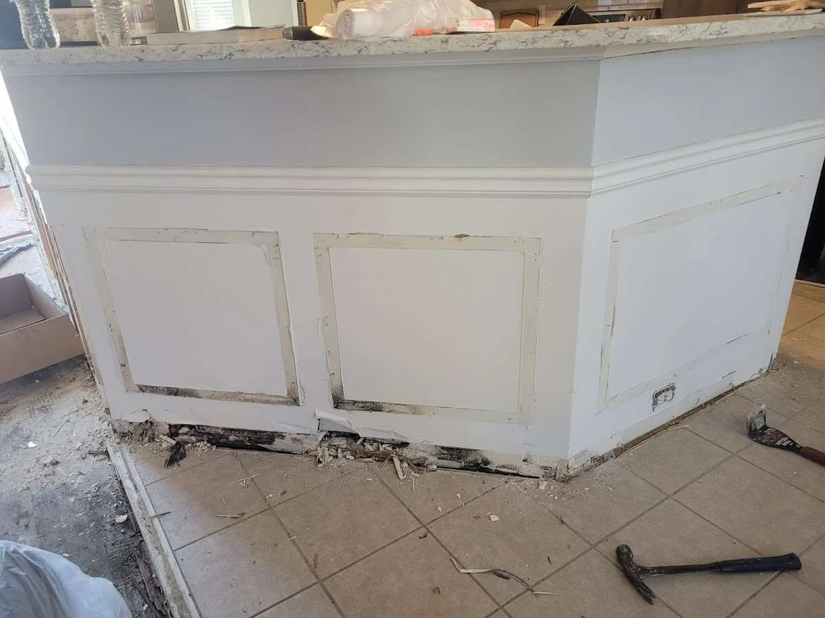 Water damage and mold on kitchen during Storm Damage Restoration in West Point